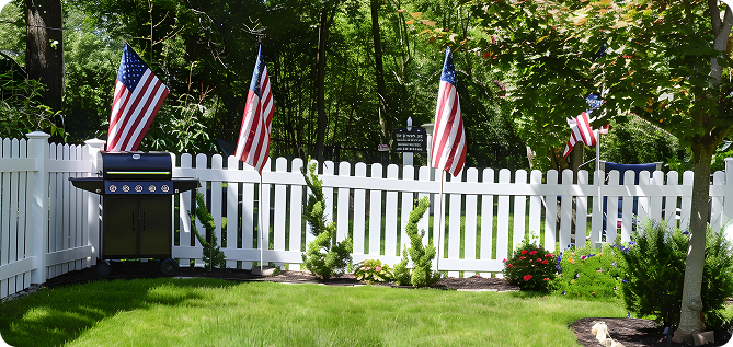 Picket Fence on green hills